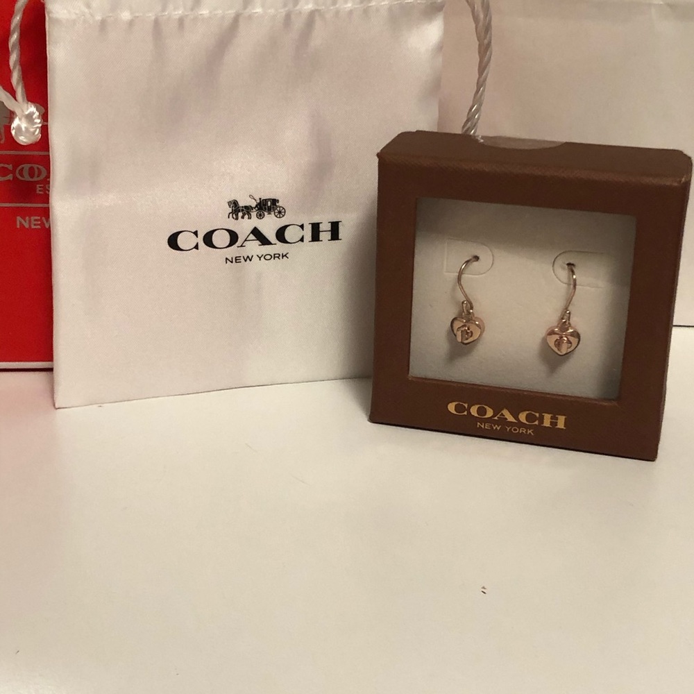 SOLD— Coach RoseGoldTurnlock Heart Earrings